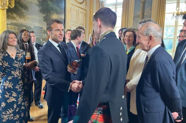 Archippus Sturrock and French President Emmanuel Macron shake hands at the Franco-British Summit at the Élysée Palace in Paris (Picture: Helene Ba)