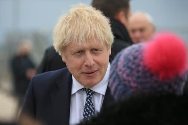 Britain's Prime Minister Boris Johnson talks to members of the public while campaigning on behalf of Conservative Party candidate Jill Mortimer ahead of the 2021 Hartlepool by-election. Picture: Lindsey Parnaby - WPA Pool/Getty Images