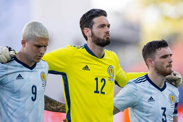 Craig Gordon lines up alongside Lyndon Dykes and Andrew Robertson for the national anthems before Scotland's 2-2 friendly draw with the Netherlands in Wednesday and could be doing so again when the nation embark on their first finals for 23 years in little over a week. (Photo by Craig Williamson / SNS Group)