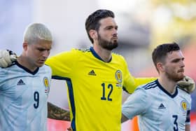 Craig Gordon lines up alongside Lyndon Dykes and Andrew Robertson for the national anthems before Scotland's 2-2 friendly draw with the Netherlands in Wednesday and could be doing so again when the nation embark on their first finals for 23 years in little over a week. (Photo by Craig Williamson / SNS Group)