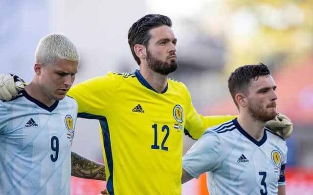 Craig Gordon lines up alongside Lyndon Dykes and Andrew Robertson for the national anthems before Scotland's 2-2 friendly draw with the Netherlands in Wednesday and could be doing so again when the nation embark on their first finals for 23 years in little over a week. (Photo by Craig Williamson / SNS Group)