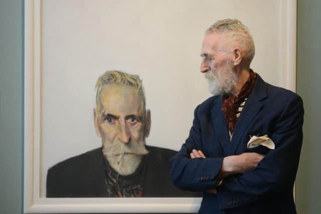 The artist with one of his many self-portraits at Kelvingrove retrospective John Byrne: A Big Adventure last year