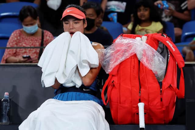 Emma Raducanu gathers her thoughts during a break in play against Elena Rybakina.