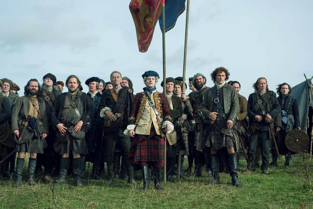 Sam Heughan as Outlander's Jamie Fraser at the battle site