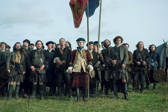 Sam Heughan as Outlander's Jamie Fraser at the battle site