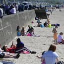 Scenes at Ayr beach as the temperature rises across Scotland