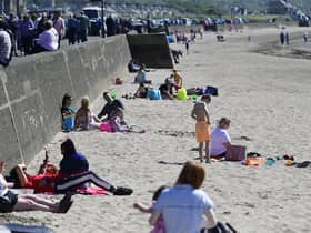 Scenes at Ayr beach as the temperature rises across Scotland