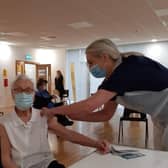 Emily Lawson, 101, being vaccinated against Covid-19.