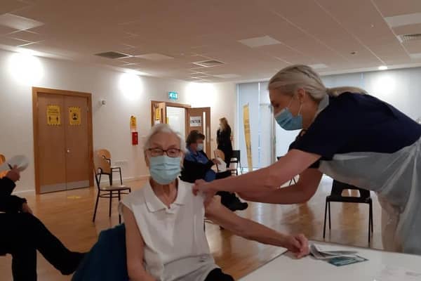 Emily Lawson, 101, being vaccinated against Covid-19.