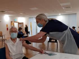 Emily Lawson, 101, being vaccinated against Covid-19.