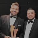 Fraser Stephen receives his award for Site Manager of the Year