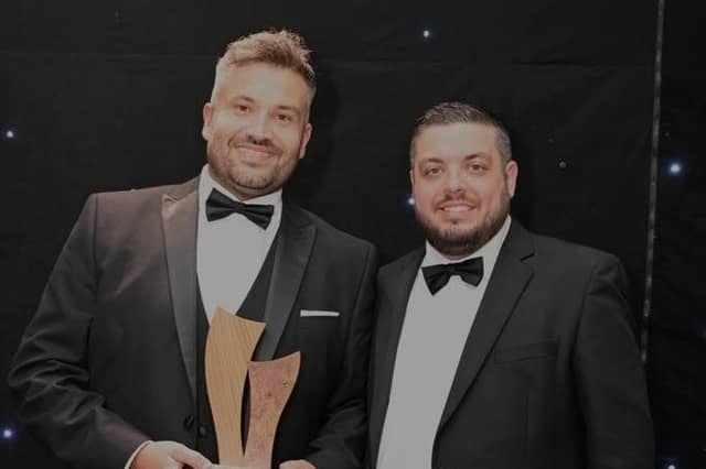 Fraser Stephen receives his award for Site Manager of the Year