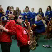 Learning to play a musical instrument has wider benefits than simply entertaining others (Picture: Julien Behal/PA Wire)
