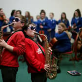 Learning to play a musical instrument has wider benefits than simply entertaining others (Picture: Julien Behal/PA Wire)