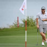 Tyrrell Hatton has a laugh about something in pro-am prior to the Abu Dhabi HSBC Championship at Yas Links. Picture: Ross Kinnaird/Getty Images.