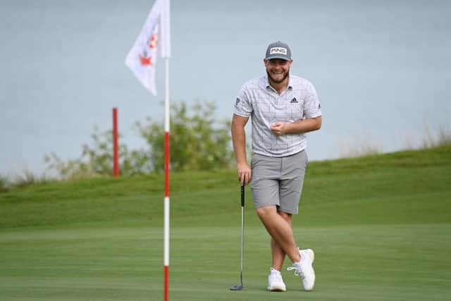 Tyrrell Hatton has a laugh about something in pro-am prior to the Abu Dhabi HSBC Championship at Yas Links. Picture: Ross Kinnaird/Getty Images.