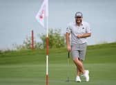 Tyrrell Hatton has a laugh about something in pro-am prior to the Abu Dhabi HSBC Championship at Yas Links. Picture: Ross Kinnaird/Getty Images.