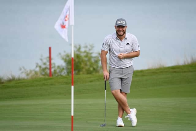 Tyrrell Hatton has a laugh about something in pro-am prior to the Abu Dhabi HSBC Championship at Yas Links. Picture: Ross Kinnaird/Getty Images.