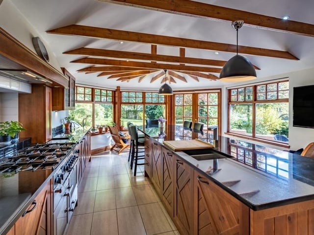 Interior: The Firs offers a spacious kitchen with large island, a formal dining room, lounge, drawing room, and library. Sleeping accommodation is found on the first floor, where stairs in the property’s turret-style top floor lead to an attractive balcony.