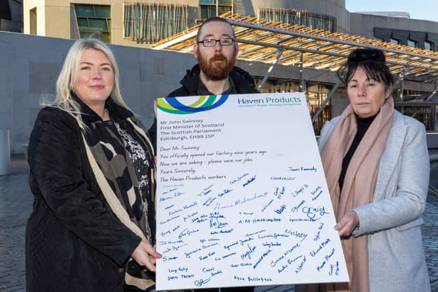 From left Head of Haven Products, Karen Motherwell with workers Calum Stewart and Lynne Paterson at the Scottish Parliament.