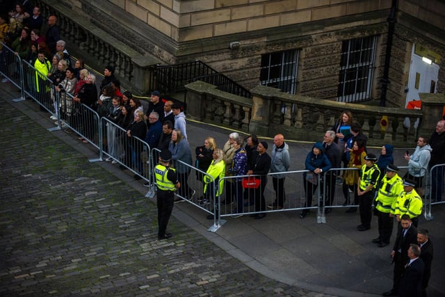 Mourners continue to file slowly past - with 4,000 people an hour expected to file through St GIles'