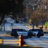 Police vehicles sit near Congregation Beth Israel Synagogue in Colleyville, Texas, some 25 miles (40 kilometers) west of Dallas, on January 16, 2022. - All four people taken hostage in a more than 10-hour standoff at the Texas synagogue have been freed unharmed (Photo by Andy JACOBSOHN / AFP) (Photo by ANDY JACOBSOHN/AFP via Getty Images)