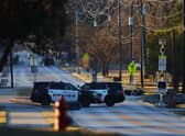 Police vehicles sit near Congregation Beth Israel Synagogue in Colleyville, Texas, some 25 miles (40 kilometers) west of Dallas, on January 16, 2022. - All four people taken hostage in a more than 10-hour standoff at the Texas synagogue have been freed unharmed (Photo by Andy JACOBSOHN / AFP) (Photo by ANDY JACOBSOHN/AFP via Getty Images)