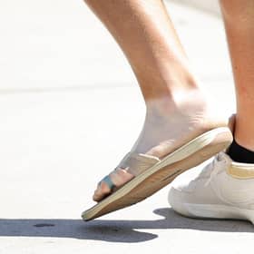 Jon Rahm, the 2021 champion, turned up at his US Open press conferene wearing a golf shoe on one foot and a flip flop on the other one as he nurses an injury. Picture: Alex Slitz/Getty Images.