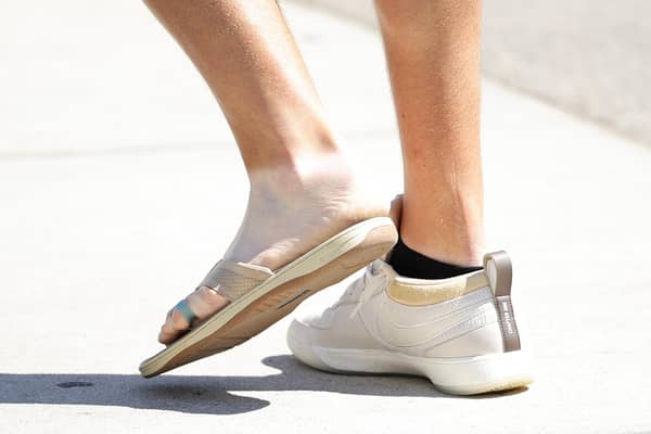 Jon Rahm, the 2021 champion, turned up at his US Open press conferene wearing a golf shoe on one foot and a flip flop on the other one as he nurses an injury. Picture: Alex Slitz/Getty Images.