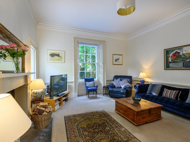 The impressive ground floor accommodation is accessed off the spacious main hall with the stunning main sitting room benefitting from a large wood burning stove