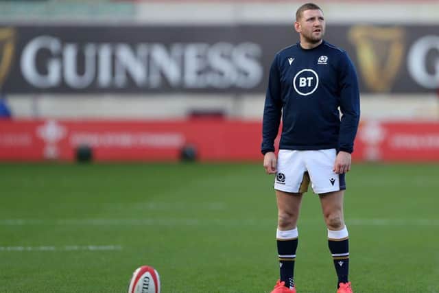 Scotland's fly-half Finn Russell warms up ahead of the 2020 Six Nations Championship rugby union match between Wales and Scotland at the Parc y Scarlets stadium in Llanelli, south Wales on October 31, 2020. (Photo by Geoff Caddick / POOL / AFP) / RESTRICTED TO EDITORIAL USE. Use in books subject to Welsh Rugby Union (WRU) approval. (Photo by GEOFF CADDICK/POOL/AFP via Getty Images)