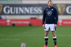 Scotland's fly-half Finn Russell warms up ahead of the 2020 Six Nations Championship rugby union match between Wales and Scotland at the Parc y Scarlets stadium in Llanelli, south Wales on October 31, 2020. (Photo by Geoff Caddick / POOL / AFP) / RESTRICTED TO EDITORIAL USE. Use in books subject to Welsh Rugby Union (WRU) approval. (Photo by GEOFF CADDICK/POOL/AFP via Getty Images)