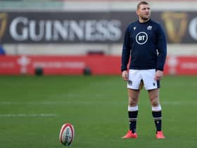 Scotland's fly-half Finn Russell warms up ahead of the 2020 Six Nations Championship rugby union match between Wales and Scotland at the Parc y Scarlets stadium in Llanelli, south Wales on October 31, 2020. (Photo by Geoff Caddick / POOL / AFP) / RESTRICTED TO EDITORIAL USE. Use in books subject to Welsh Rugby Union (WRU) approval. (Photo by GEOFF CADDICK/POOL/AFP via Getty Images)