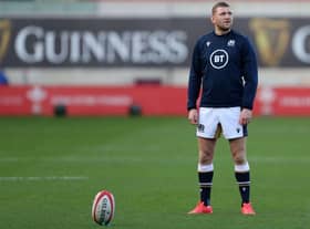 Scotland's fly-half Finn Russell warms up ahead of the 2020 Six Nations Championship rugby union match between Wales and Scotland at the Parc y Scarlets stadium in Llanelli, south Wales on October 31, 2020. (Photo by Geoff Caddick / POOL / AFP) / RESTRICTED TO EDITORIAL USE. Use in books subject to Welsh Rugby Union (WRU) approval. (Photo by GEOFF CADDICK/POOL/AFP via Getty Images)