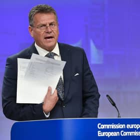 European Commissioner for Inter-institutional Relations and Foresight Maros Sefcovic holds up documents as he speaks during a media conference at EU headquarters in Brussels. Picture: AP Photo/Geert Vanden Wijngaert
