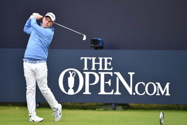 Bob MacIntyre tees off in the first round of the 148th Open at Royal Portrush, where he tied for sixth to secure an exemption for next week's delayed staging at Royal St George's. Picture: Paul Ellis/AFP via Getty Images.
