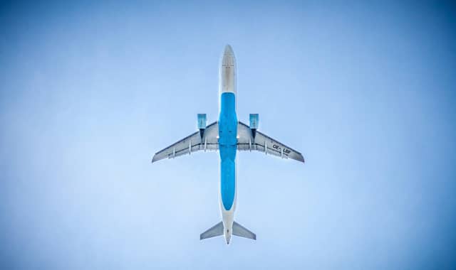 Academics and staff at the University of Glasgow will be taking fewer flights in a bid to cut emissions from transport by 7.5 per cent each year