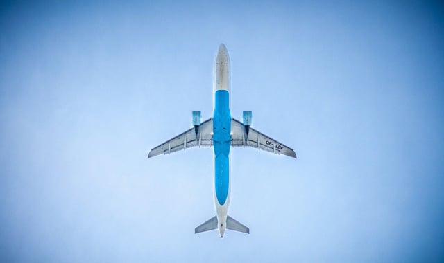 Academics and staff at the University of Glasgow will be taking fewer flights in a bid to cut emissions from transport by 7.5 per cent each year