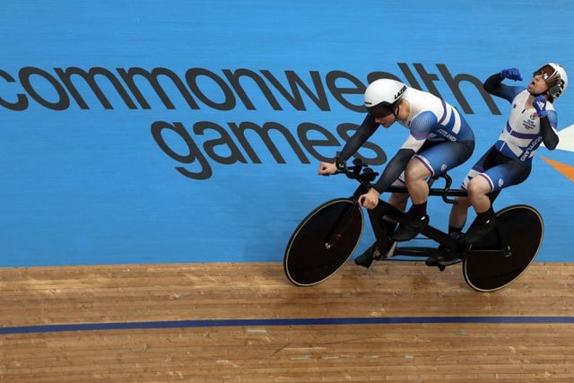 Scotland's Neil Fachie celebrates with pilot Lewis Stewart after winning the men's para-sport 1000m B time trial tandem final on day one of the Commonwealth Games.