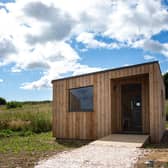 The self-catering cabins are situated a short walk away from the main venue and, as part of plans to rewild the farm in which the facility is located, the cabins will eventually be situated in a native wildflower meadow.