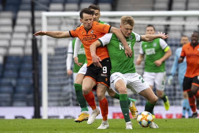 Hibs Josh Doig and Marc McNulty in action during a Scottish Cup semi-final match between Dundee United and Hibernian at Hampden Park, on May 08, 2021, in Glasgow, Scotland. (Photo by Ross Parker / SNS Group)