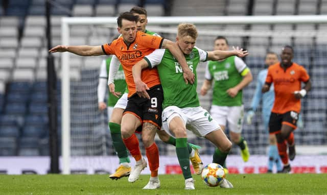 Hibs Josh Doig and Marc McNulty in action during a Scottish Cup semi-final match between Dundee United and Hibernian at Hampden Park, on May 08, 2021, in Glasgow, Scotland. (Photo by Ross Parker / SNS Group)