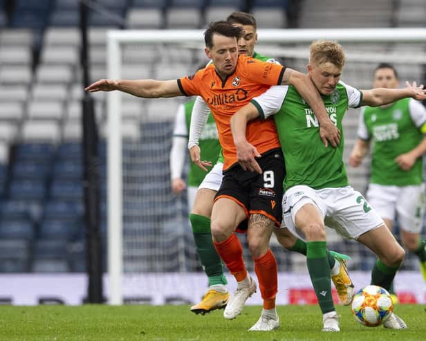 Hibs Josh Doig and Marc McNulty in action during a Scottish Cup semi-final match between Dundee United and Hibernian at Hampden Park, on May 08, 2021, in Glasgow, Scotland. (Photo by Ross Parker / SNS Group)