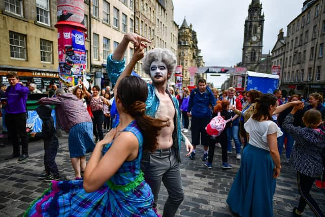 Fringe performers on the Royal Mile.