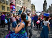 Fringe performers on the Royal Mile.