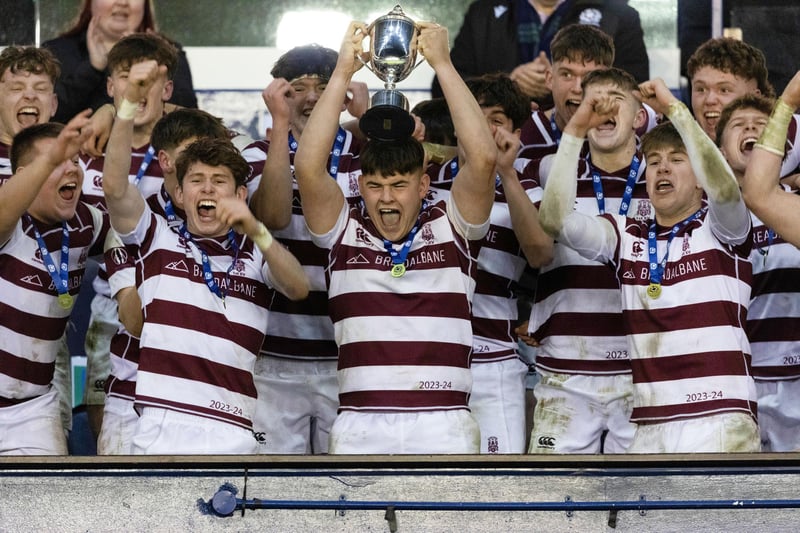 George Watson's lift the trophy after winning the Scottish Schools U-18 Cup Final. (Photo by Mark Scates / SNS Group)
