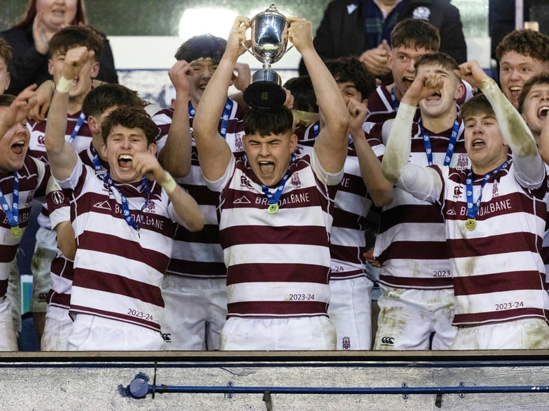 George Watson's lift the trophy after winning the Scottish Schools U-18 Cup Final. (Photo by Mark Scates / SNS Group)