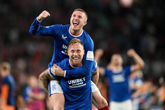 Scott Arfield (front) is looking forward to visiting Anfield with Rangers.