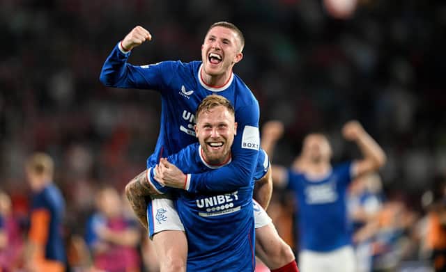Scott Arfield (front) is looking forward to visiting Anfield with Rangers.