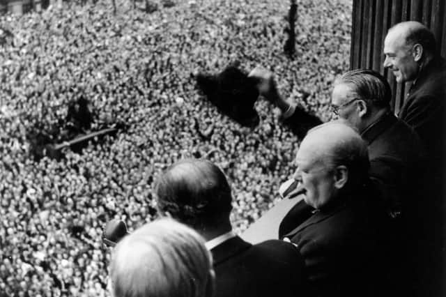 Churchill also made an appearance on the balcony of the Ministry of Health Building in Whitehall, where he delivered a speech (Photo: Keystone/Hulton Archive/Getty Images)